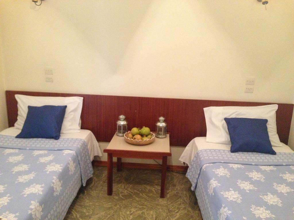 Noufara Hotel Kaména Voúrla Rom bilde